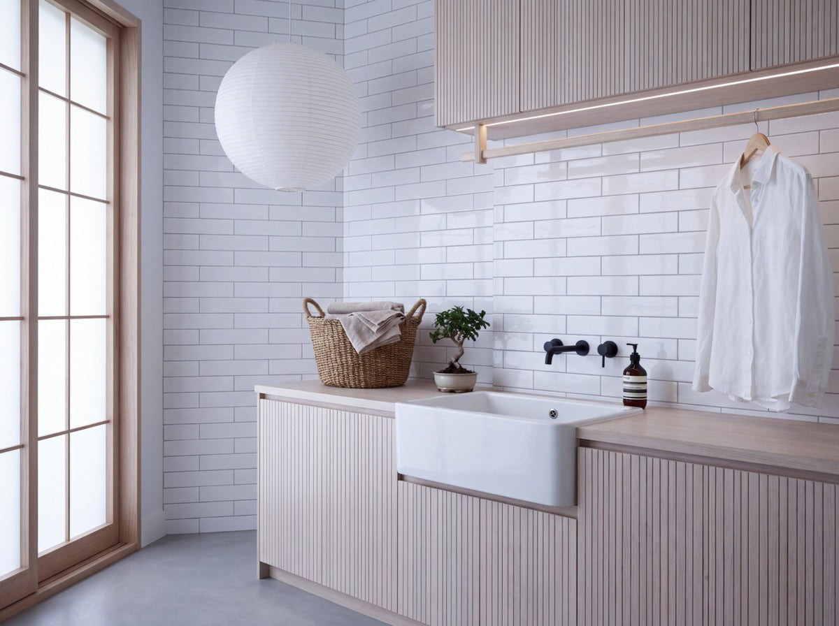Boulevard White Plain Gloss 75x300 tiles in a laundry