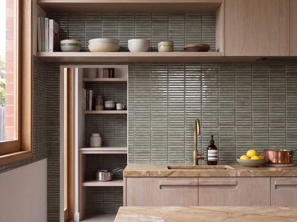 Shiki Sticks Pale Lagoon Porcelain Glazed 12x92 Finger Mosaic tiles in a room