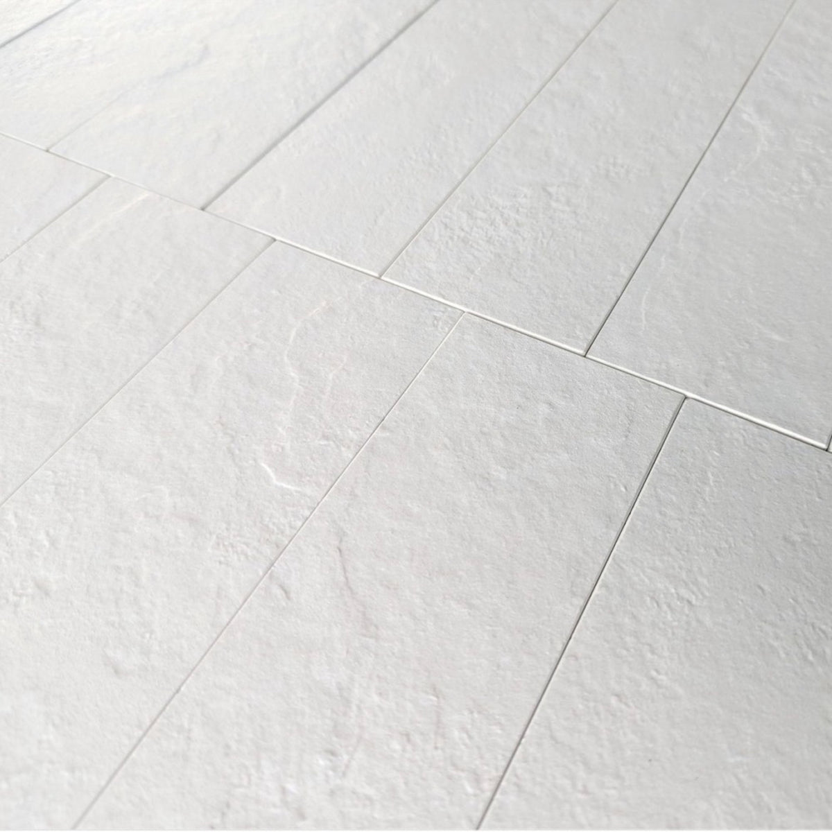 Bacchus White 70% Textured Porcelain Honed 75x300 tile