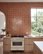 Blocchi Burnt Ochre Gloss 100x100 tiles in a kitchen