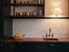 Blocchi Saltpan Matt 100x100 tiles in a pantry