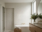 Blocchi Whitecap Gloss 100x100 tiles in a room