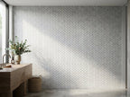 Gellibrand Cirrus Herringbone Mosaic Honed 30x100 tiles in a room