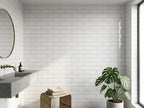 Risotto Whitecap Gloss 75x200 tiles in a room