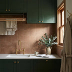 Spinifex Ochre Matt 100x100 tiles in a room