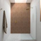 Spinifex Ochre Matt 75x300 tiles in a room