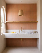Tarwin Ochre Matt 50x150 tiles in a kitchen