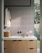 Tarwin Pebble 3D Matt 50x150 tiles in a laundry
