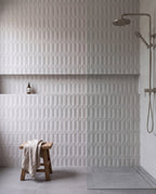 Tarwin Pebble 3D Matt 50x150 tiles in a shower