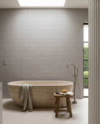 Tarwin Pebble Matt 100x100 tiles in a room