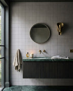 Tarwin Pebble Matt 100x100 tiles in a powder
