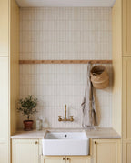 Tarwin Sandbar Matt 50x150 tiles in a laundry