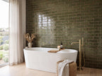 Tuart Kelp Gloss 75x300 tiles in a room