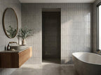 Tuart Shale Gloss 75x300 tiles in a room