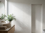 Waratah Whitecap Cushion Edge Matt 100x100 tiles in a room