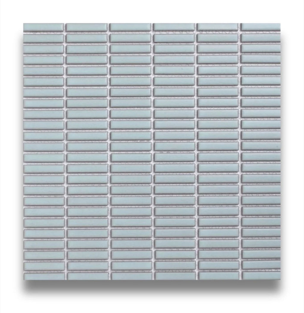 Tomo Powder Blue Satin 9.5x47 Finger Mosaic tiles in a powder